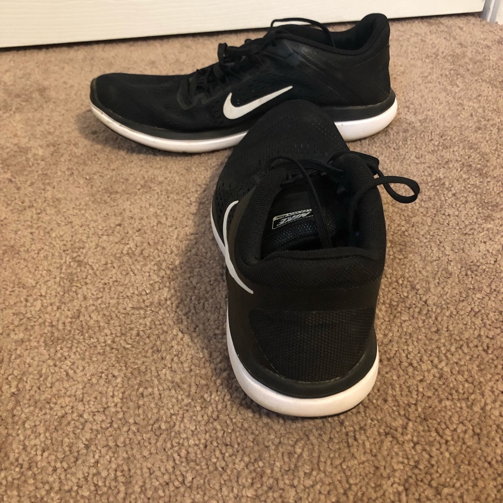 Black Nike running shoes